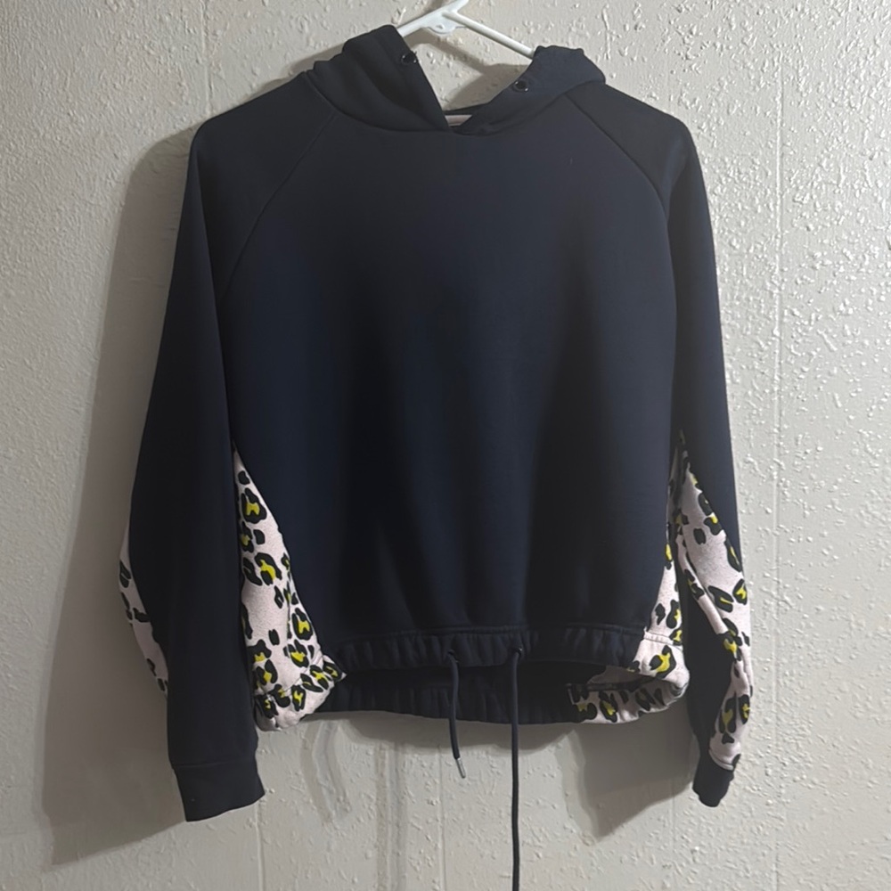 Chic Black Hoodie with Leopard Print Sleeves